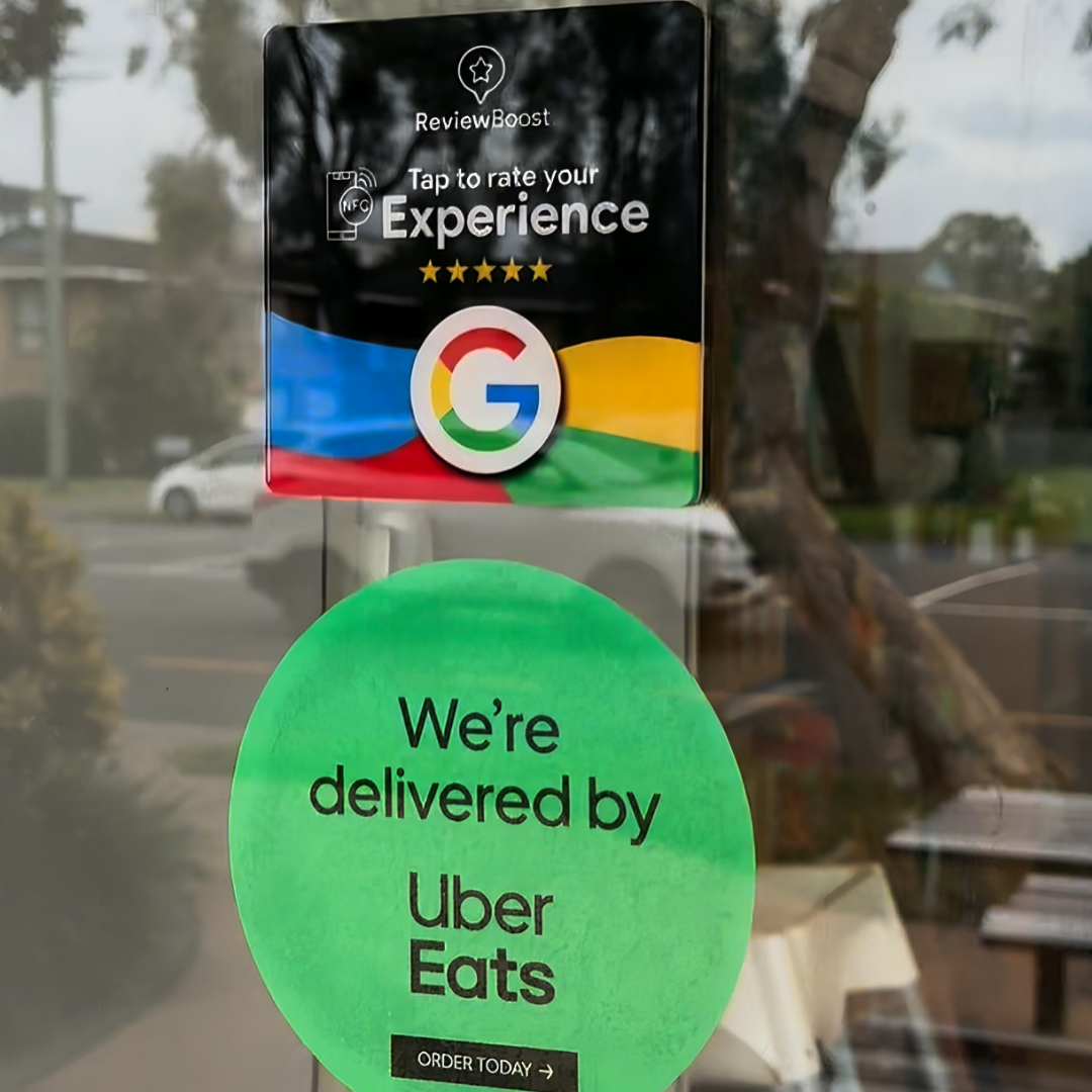 reviewboost google review plaque on a cafe window